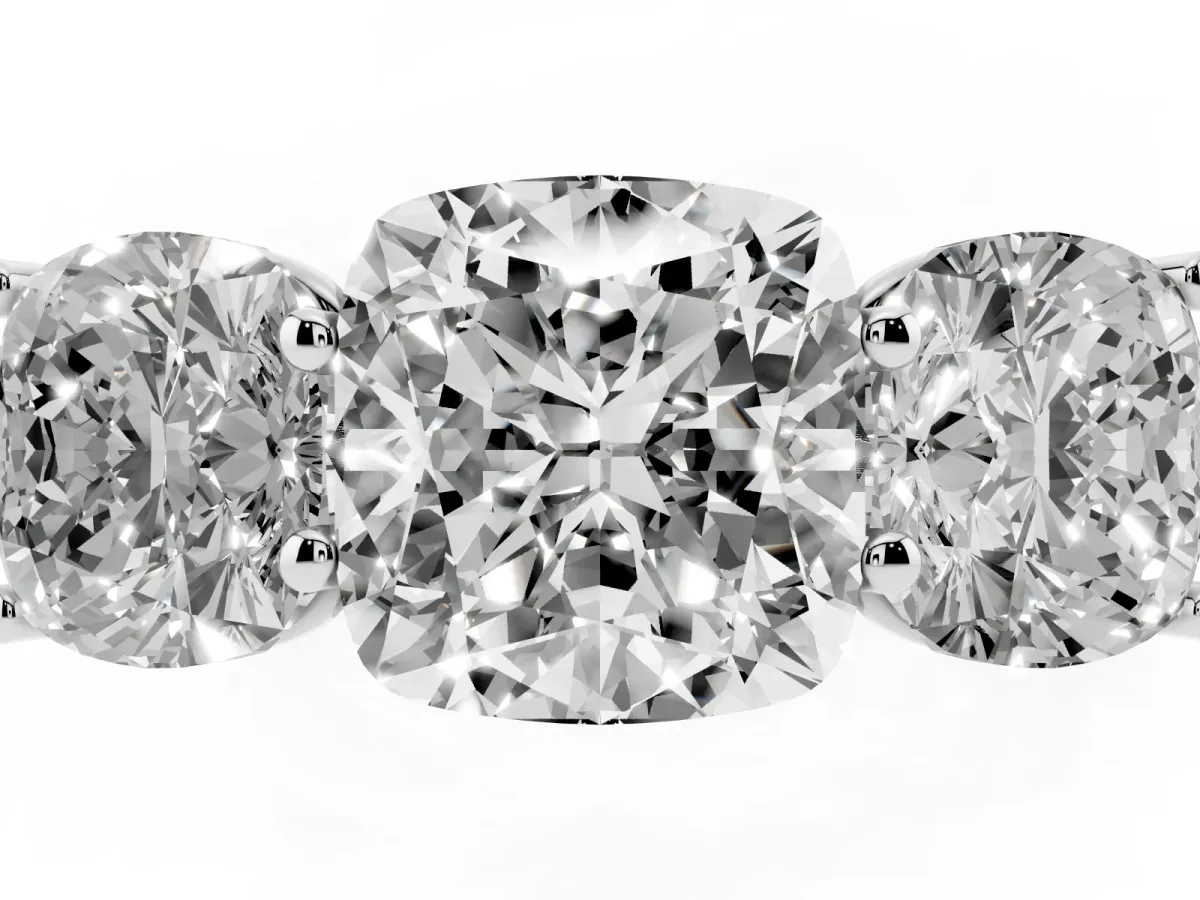Cushion Cut Three-Stone Diamond Ring with Prong Setting on a Classic Band Silver