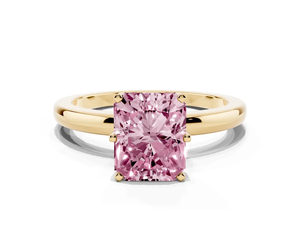 Fancy Pink Radiant Cut Solitaire Diamond Ring with Six-Prong Setting on a Classic Band Yellow gold