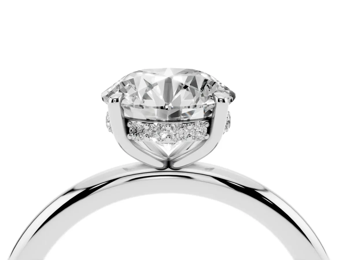 Round Cut Diamond Solitaire Ring with Thin Band and Four-Prong Setting Silver