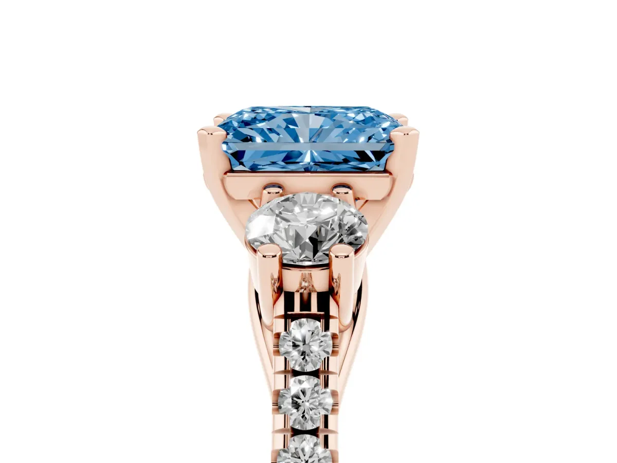 Fancy Blue Three-Stone Radiant Cut Diamond Pavé Band with Four-Prong Setting Rose gold