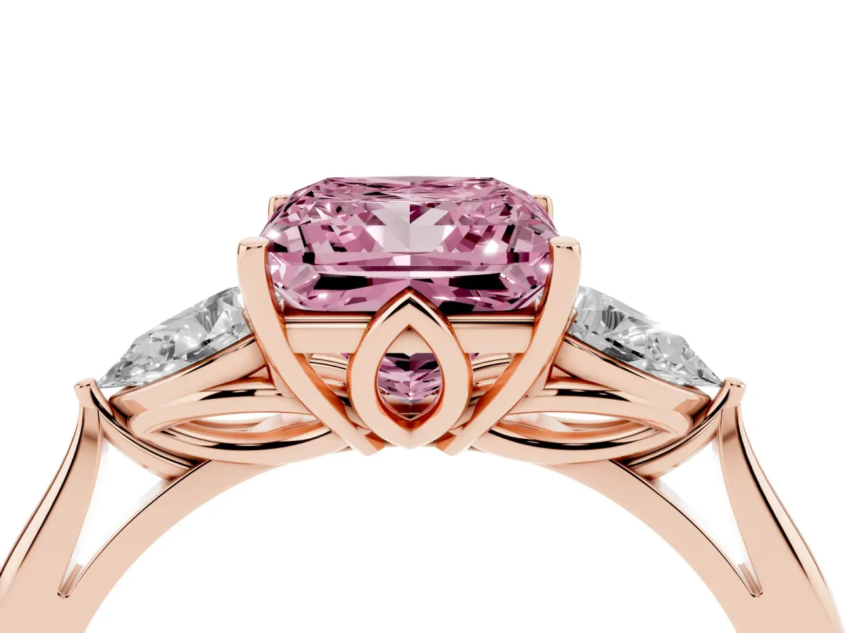 Fancy Pink Three-Stone Princess Cut Diamond Ring with Pear Side Stones in Four-Prong Setting Rose gold