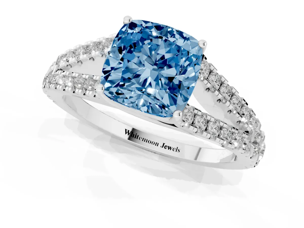 Fancy Blue Cushion Cut Diamond Split Shank Pavé Engagement Ring with Four-Prong Setting Platinum