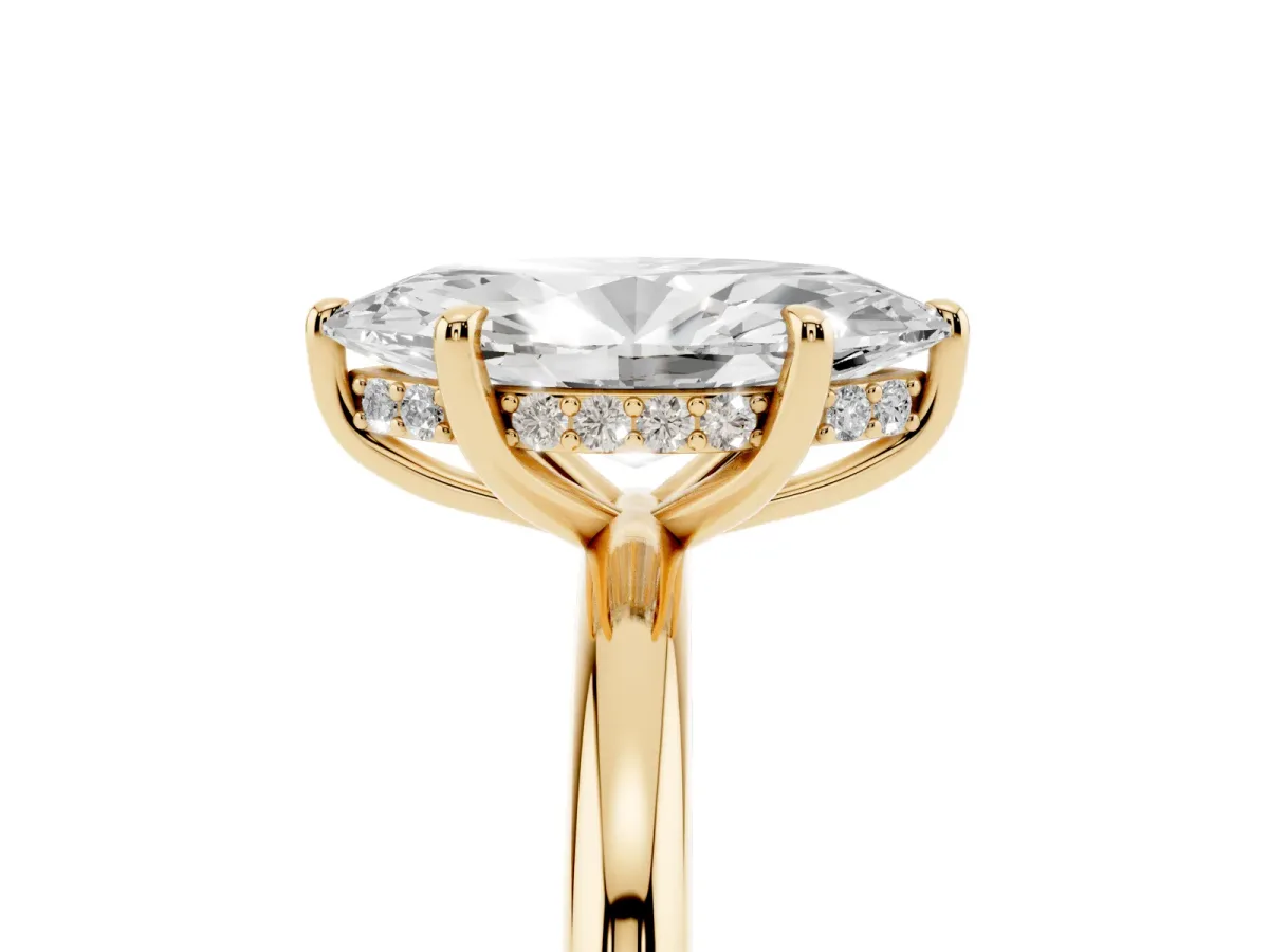 Marquise Cut Diamond Solitaire Ring with Thin Band and Four-Prong Setting Yellow gold