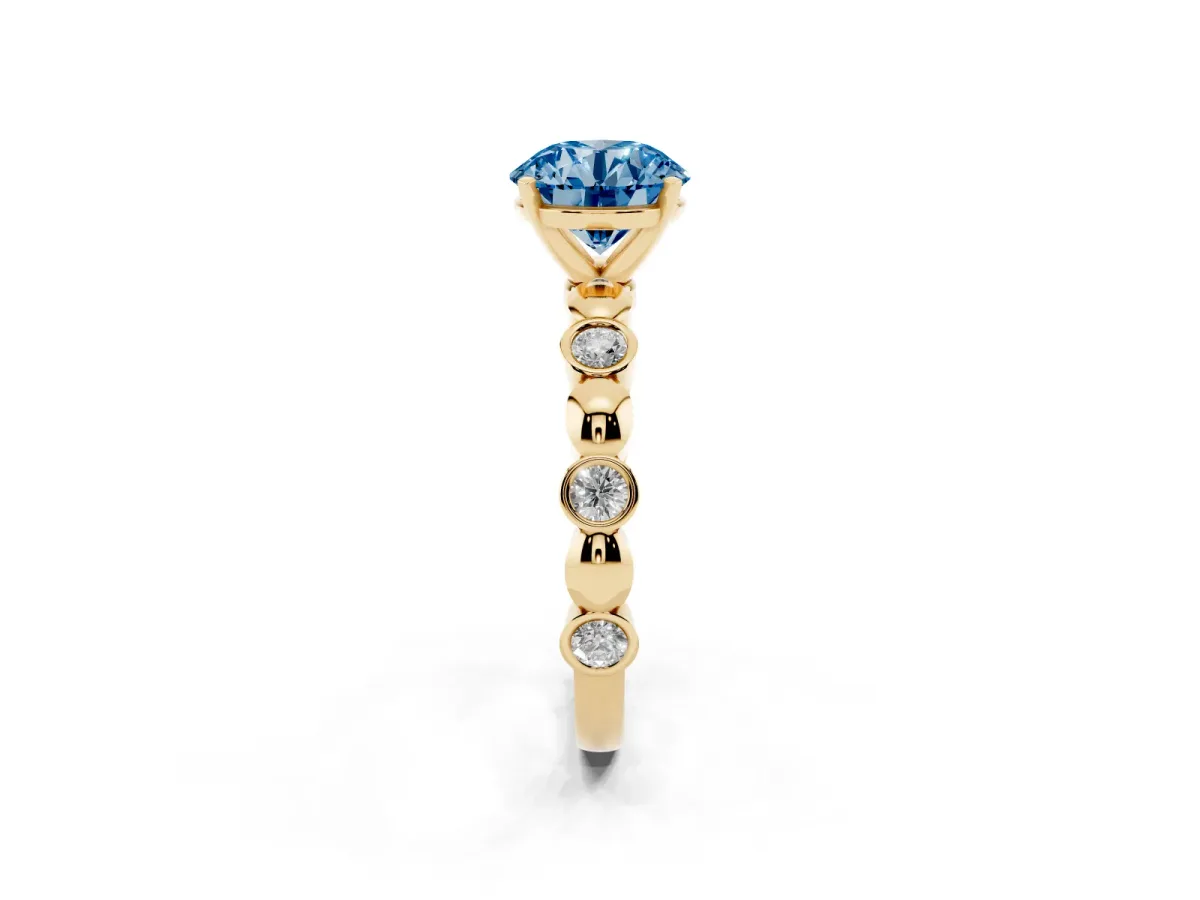 Fancy Blue Round Cut Solitaire Bezel-Set Diamond Ring with Beaded Band and Four-Prong Setting Yellow gold