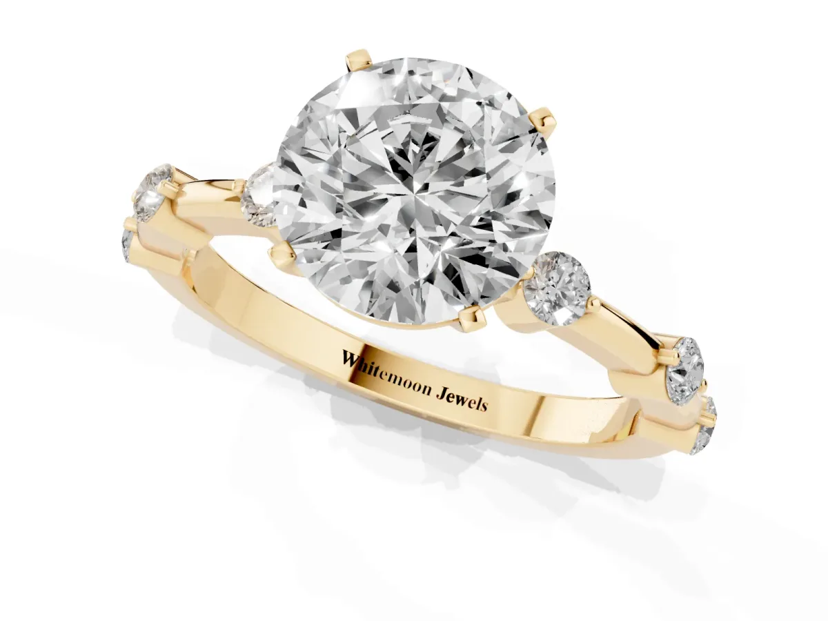 Round Cut Solitaire Diamond Ring with Bezel Set Side Stones and Prong Setting Yellow gold