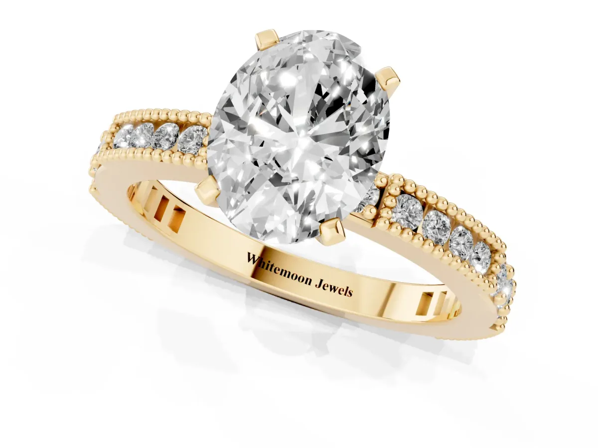Oval Cut Solitaire with Pavé Band and Four-Prong Setting Yellow gold