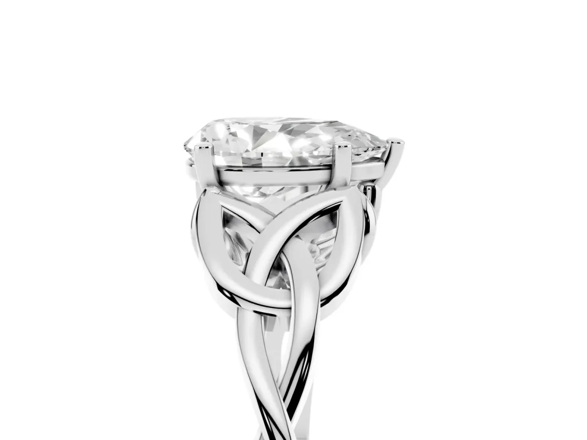 Pear Cut Diamond Solitaire Engagement Ring with Celtic Knot Band and Four-Prong Setting White gold