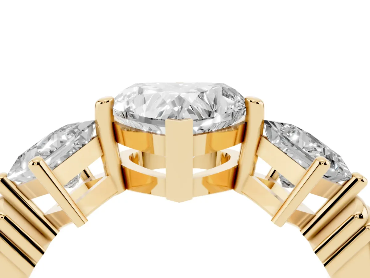 Three-Stone Heart Cut and Princess Cut Diamond Ring with Channel Band and Four-Prong Setting Yellow gold