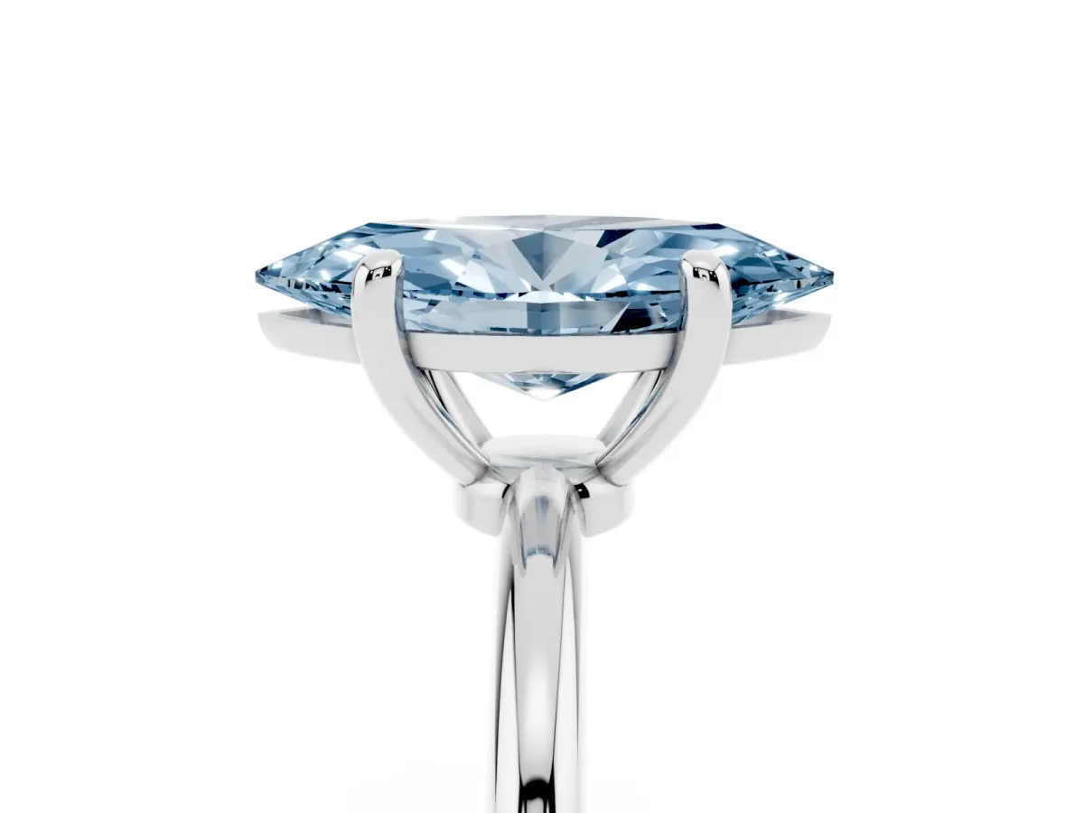 Fancy Blue Marquise Cut Solitaire Diamond Ring with 4-Prong Setting on a Classic Band Silver