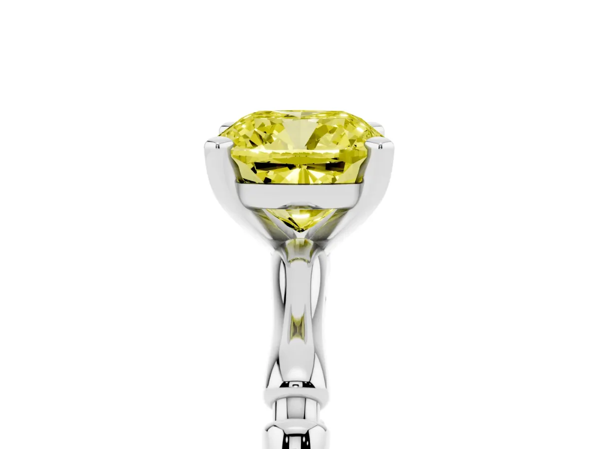 Fancy Yellow Cushion Cut Solitaire Diamond Ring with Bamboo Band and Four-Prong Setting Platinum