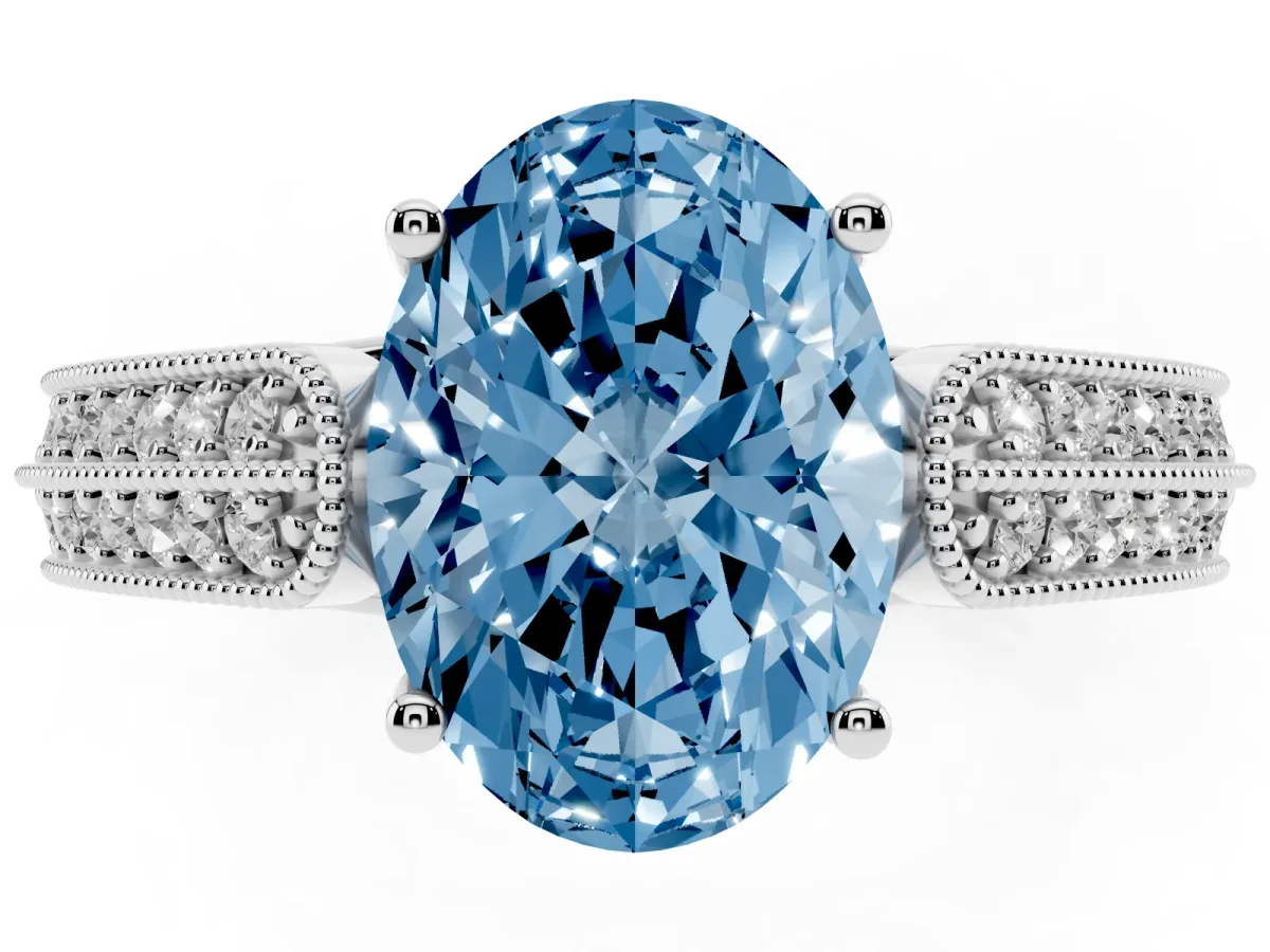 Fancy Blue Oval Cut Cut Pave Split Shank Engagement Ring with Four-Prong Setting White gold