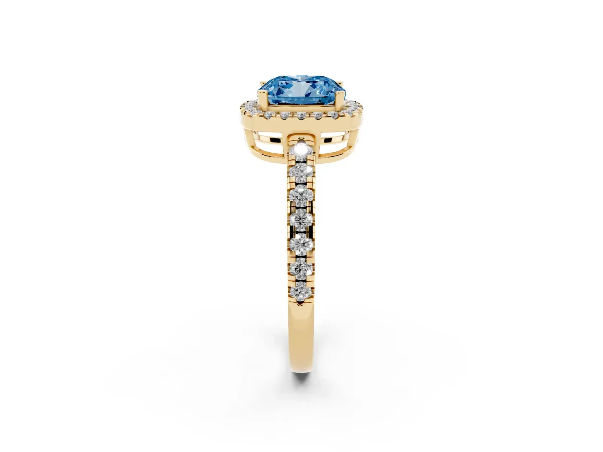 Fancy Blue Cushion Cut Diamond Halo Ring with Pavé Band and Four-Prong Setting Yellow gold
