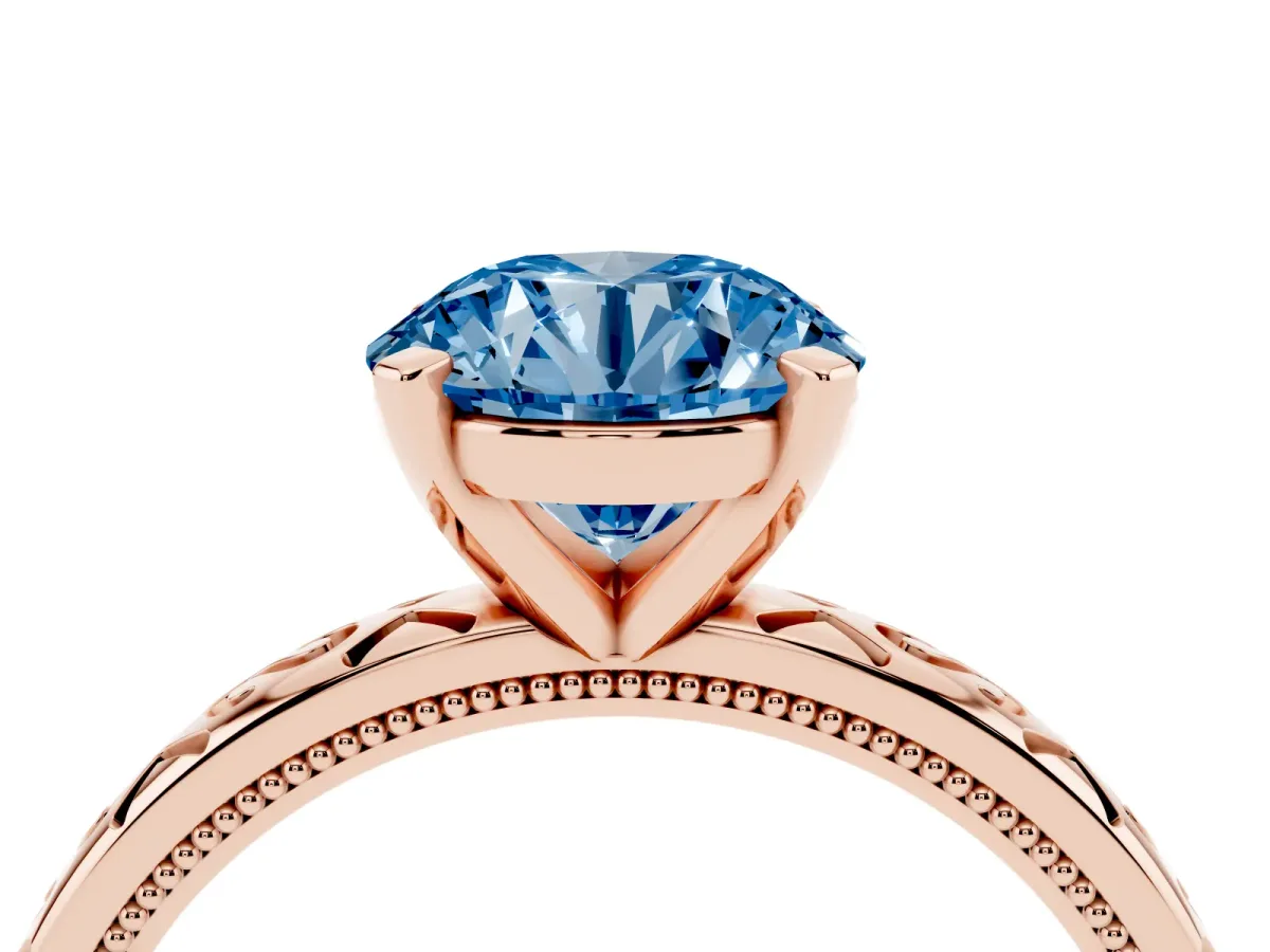 Fancy Blue Round Cut Solitaire Engagement Ring with Scrollwork Band and Four-Prong Setting Rose gold