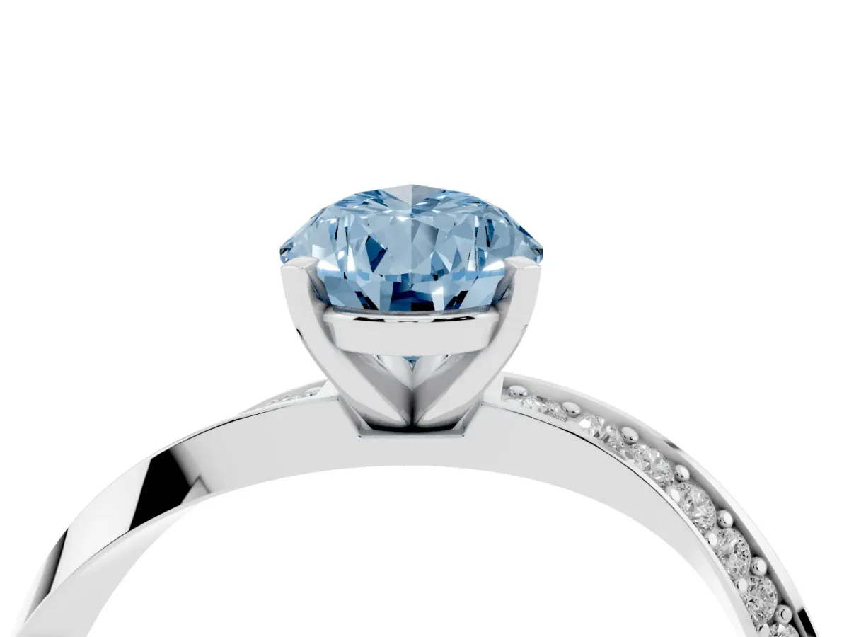 Fancy Blue Pear Cut Diamond Engagement Ring with Side Stone Accents and Four-Prong Setting Silver