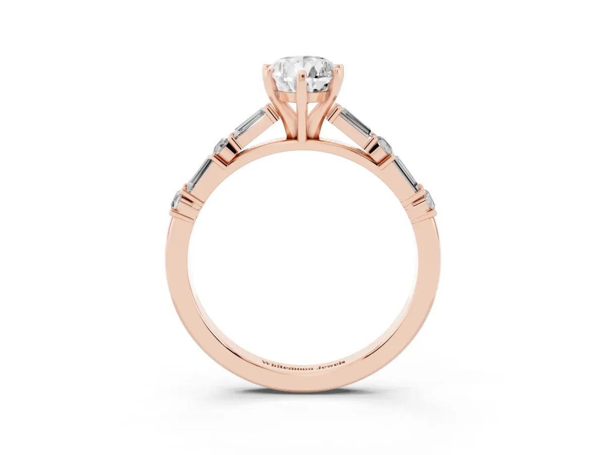 Pear Cut Diamond Solitaire with Side Baguettes and Channel Set Band Rose gold