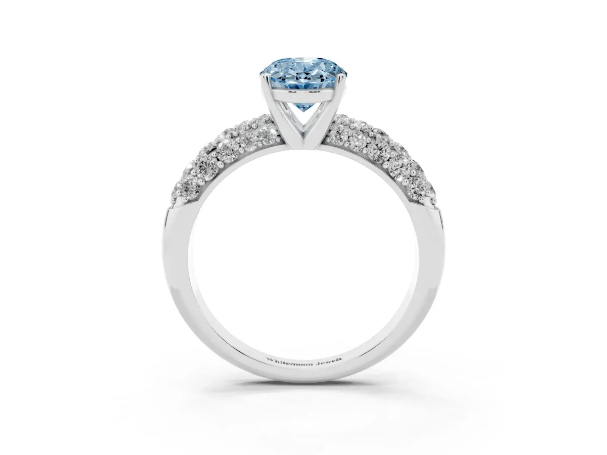 Fancy Blue Oval Cut Diamond Pavé Band Solitaire Ring with Four-Prong Setting Silver