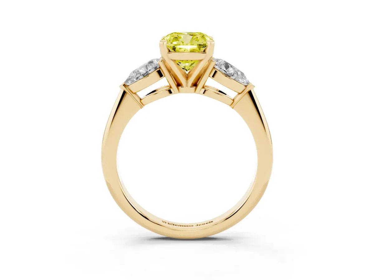 Fancy Yellow Three-Stone Cushion Cut Diamond Ring with Pear Side Stones and Four-Prong Setting Yellow gold