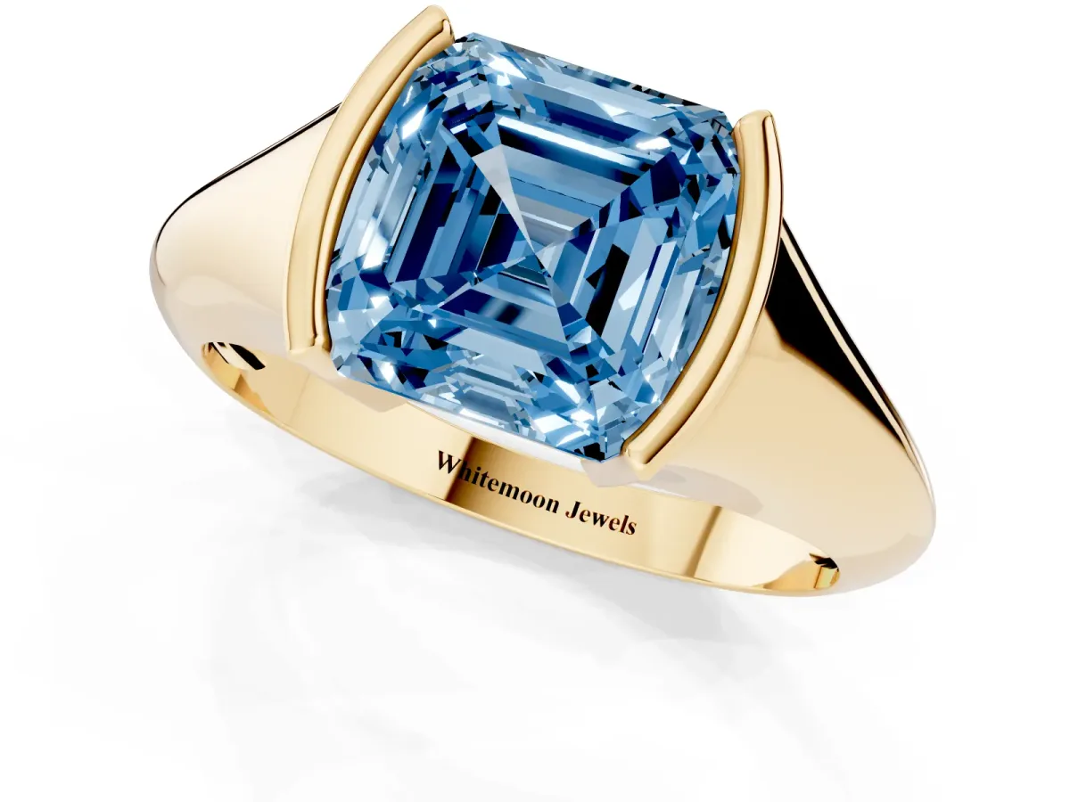 Fancy Blue Asscher Cut Solitaire Tension Set Diamond Ring Yellow gold
