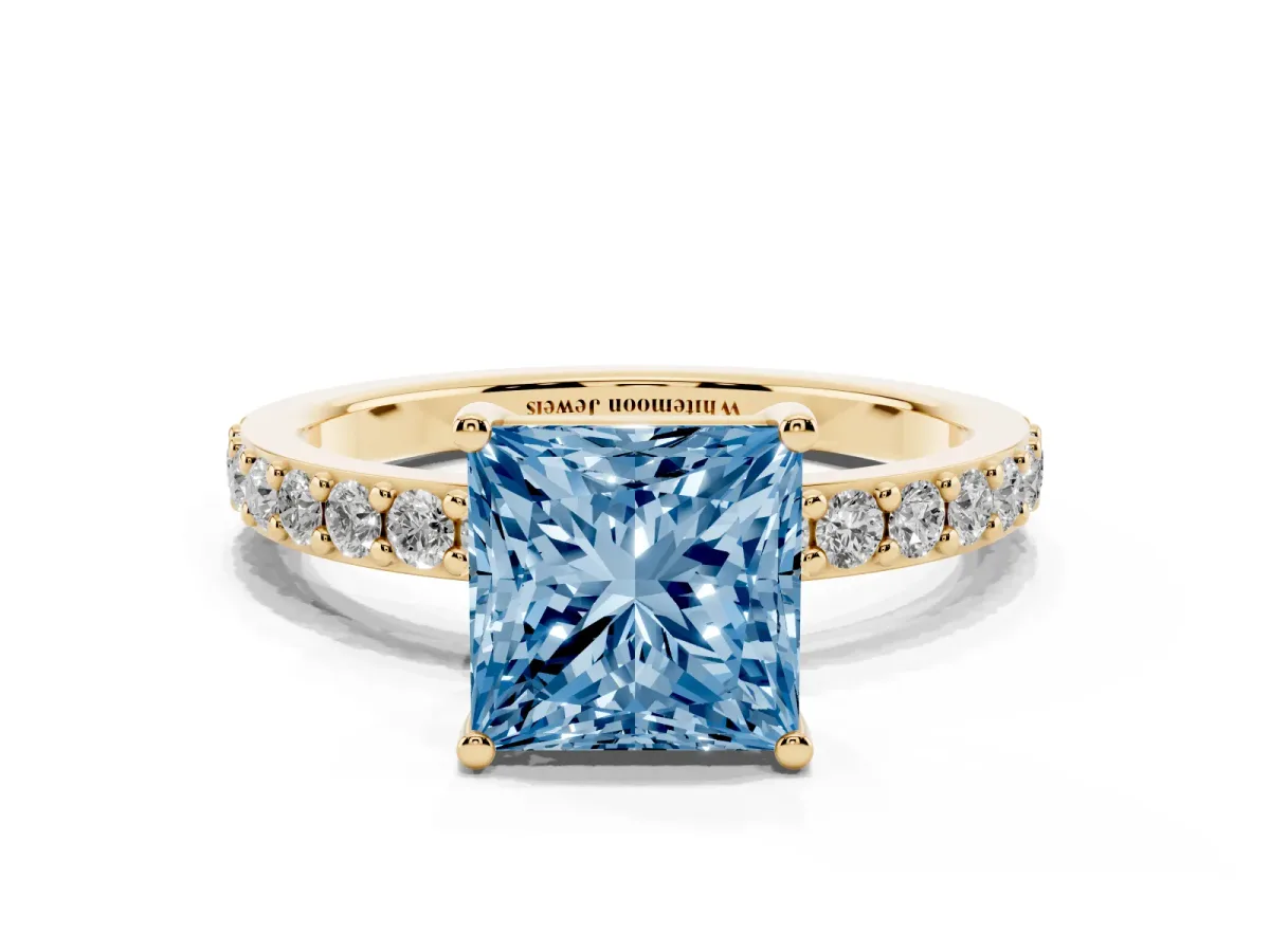 Fancy Blue Princess Cut Cut Diamond Solitaire with Pave Band and Four-Prong Setting Yellow gold
