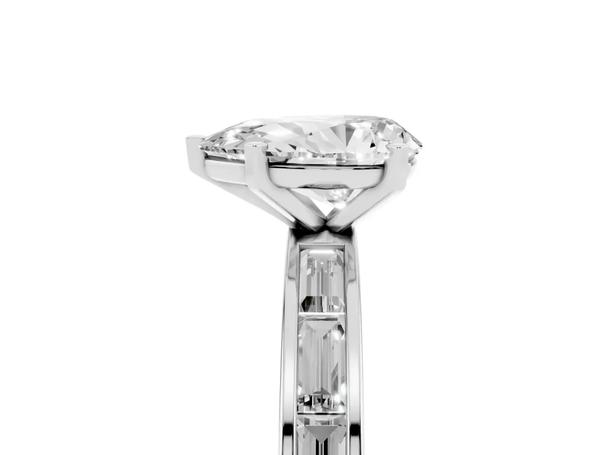 Pear Cut Solitaire Diamond Ring with Channel-Set Baguette Band and Four-Prong Setting White gold