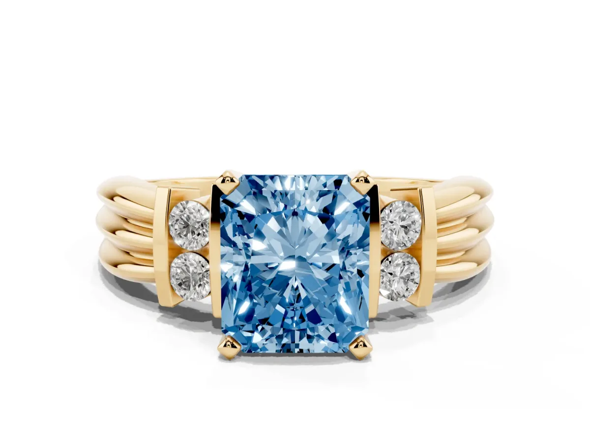 Fancy Blue Radiant Cut Cut Three-Stone Channel Set Ring with Bar Prongs Yellow gold
