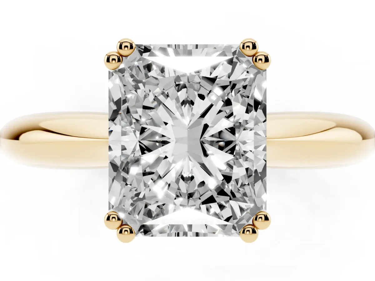 Radiant Cut Cut Solitaire Engagement Ring with Tapered Band and Four-Prong Setting Yellow gold