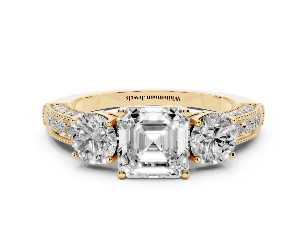 Asscher Cut Three-Stone Diamond Ring with Pavé Band and Four-Prong Setting Yellow gold