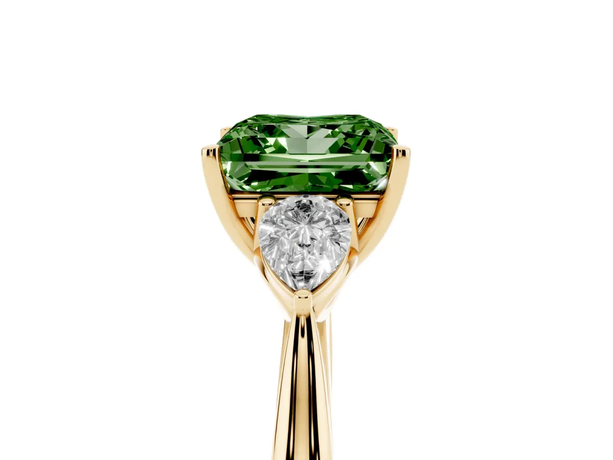 Fancy Green Three-Stone Princess Cut Diamond Ring with Pear Side Stones in Four-Prong Setting Yellow gold