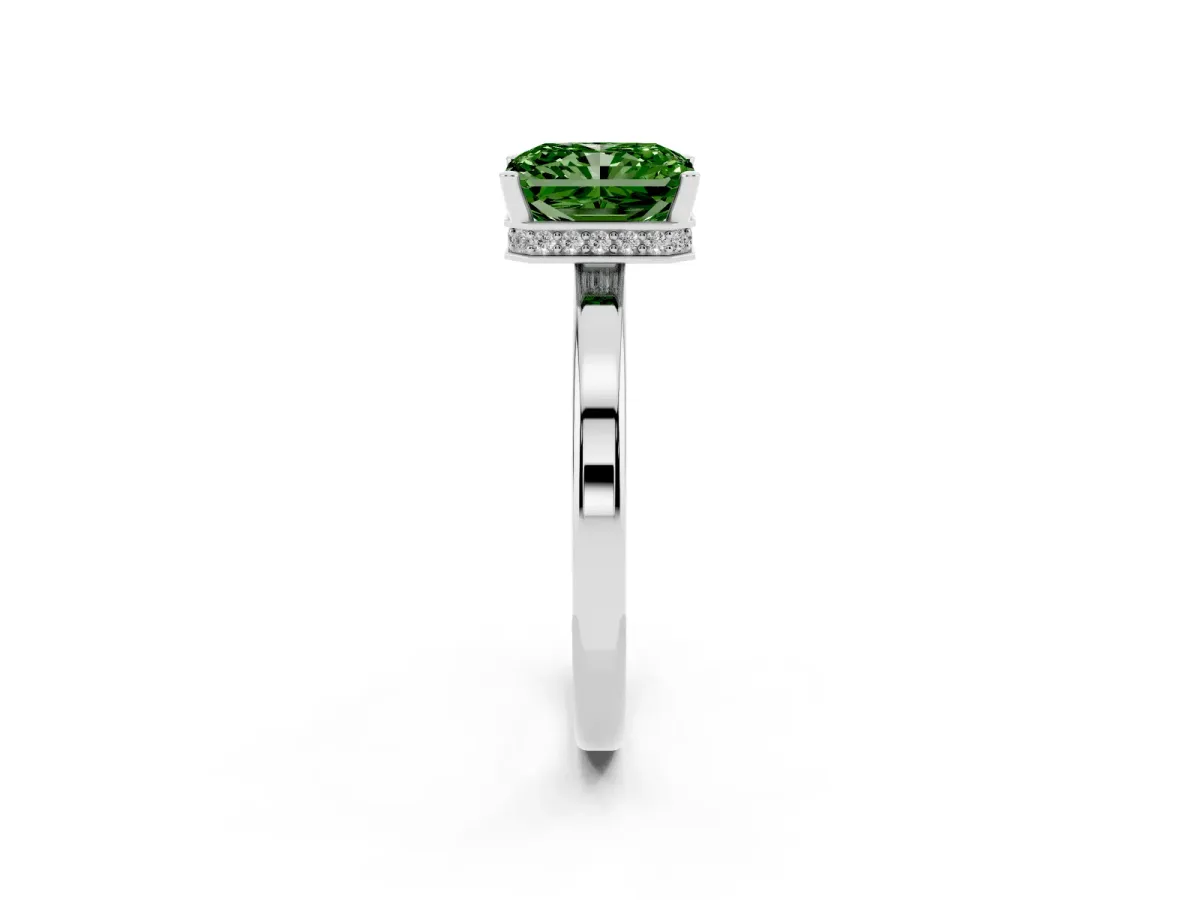 Fancy Green Radiant Cut Cut Solitaire Engagement Ring with Four-Prong Setting on a Classic Band Silver