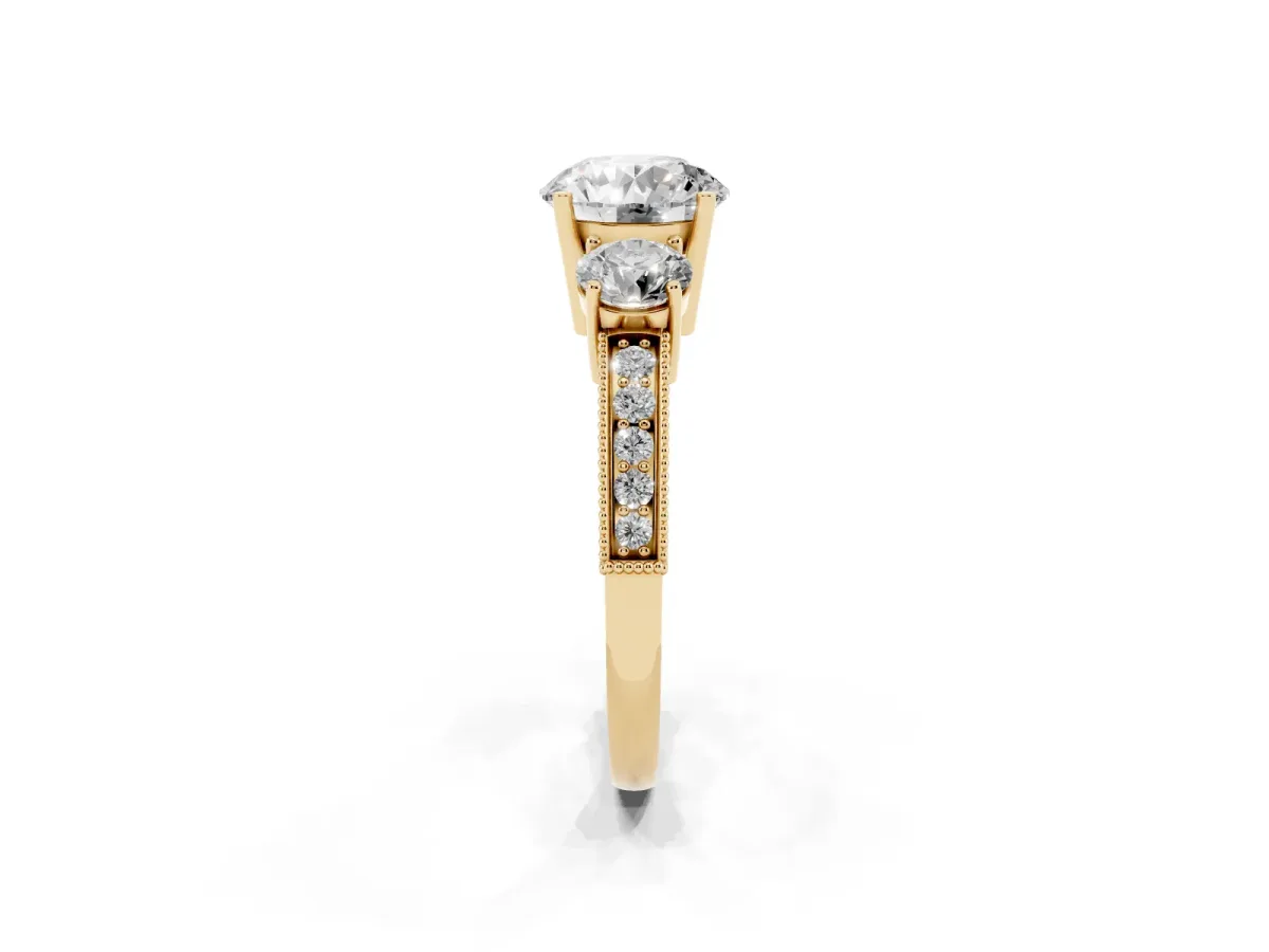 Round Cut Three-Stone Diamond Ring with Pavé Band and Four-Prong Setting Yellow gold