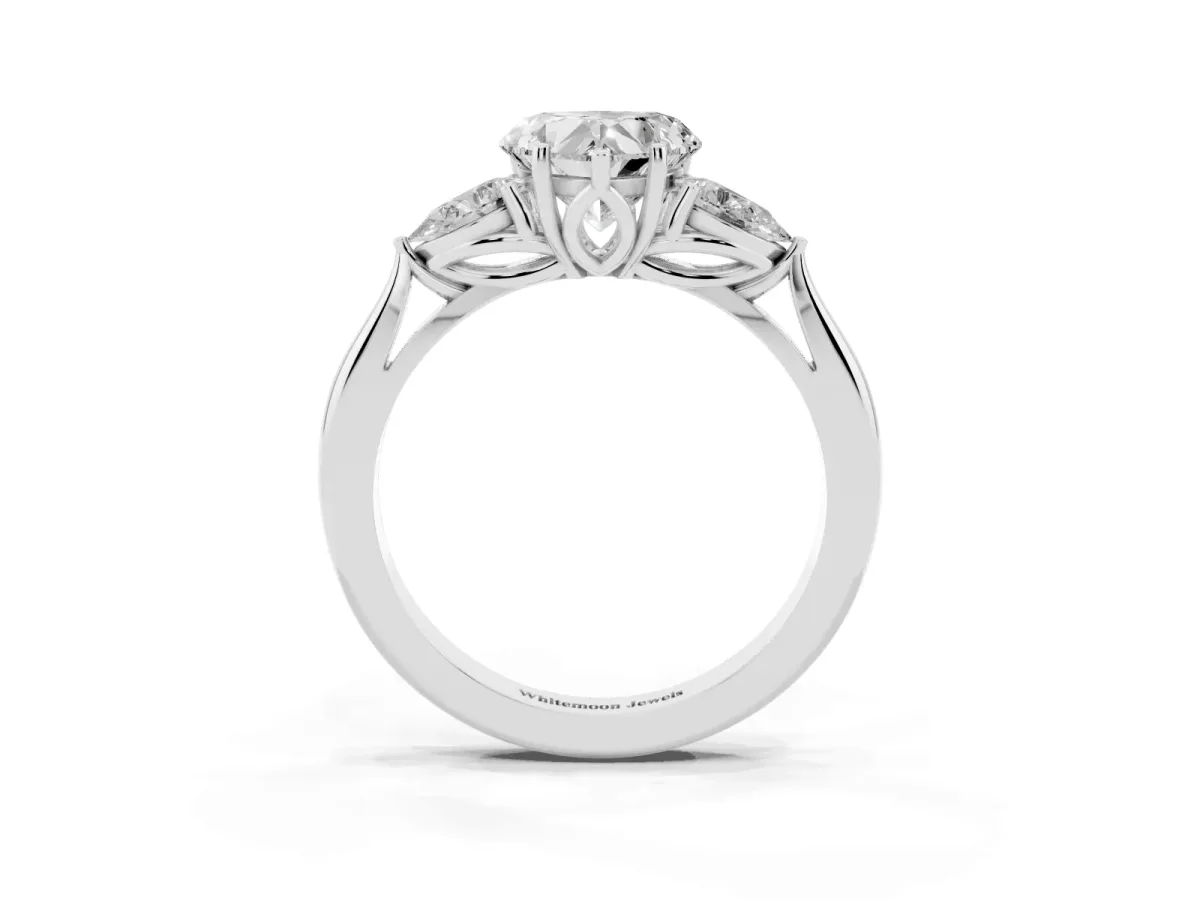 Three-Stone Heart Cut Diamond Ring with Pear Side Stones in Four-Prong Setting Silver