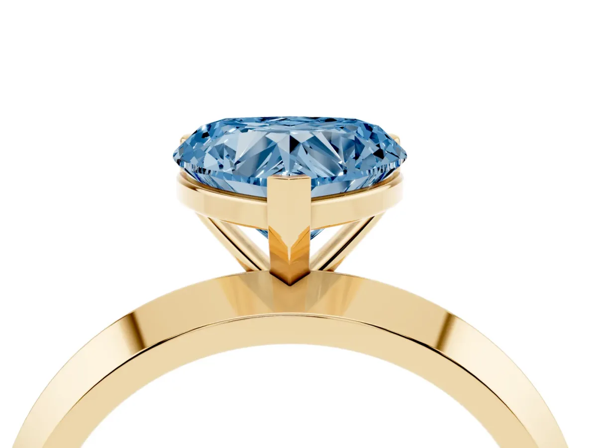 Fancy Blue Heart Cut Cut Solitaire Engagement Ring with Flat Band and Four-Prong Setting Yellow gold