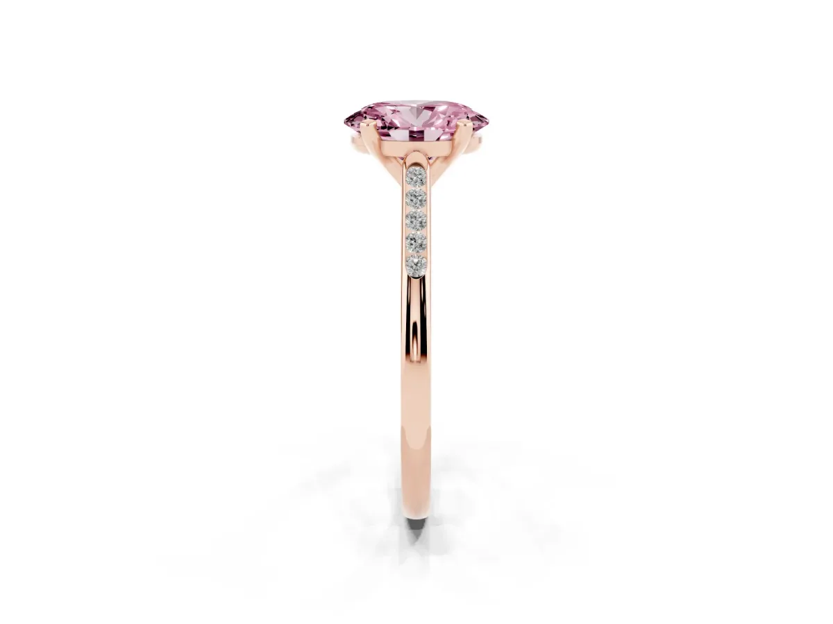 Fancy Pink Oval Cut Diamond Solitaire Ring with Channel Set Round Band and Prong Setting Rose gold