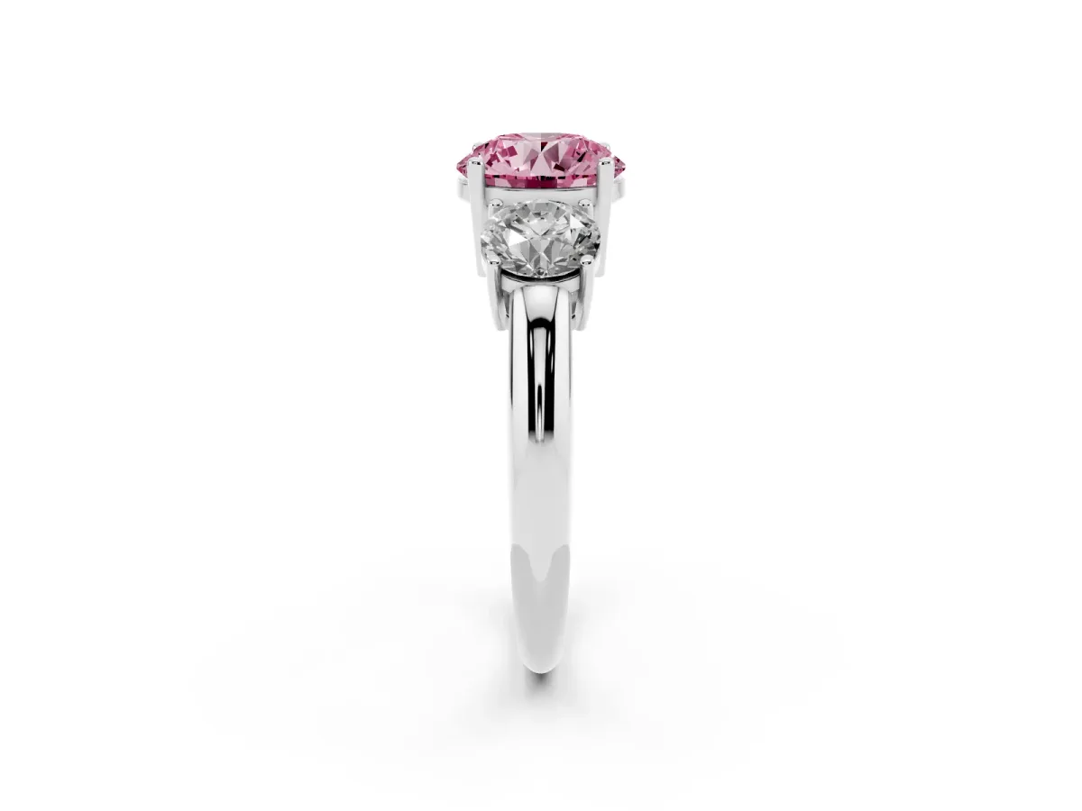 Fancy Pink Three-Stone Round Cut Cut Diamond Engagement Ring with Prong Setting on a White Gold Band Silver