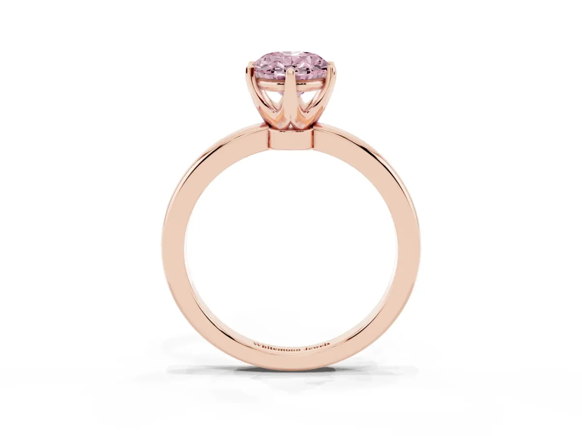 Fancy Pink Oval Cut Solitaire Diamond Ring with Six-Prong Setting on a Classic Band Rose gold