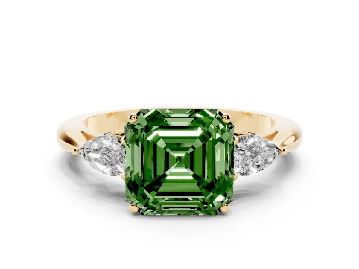 Fancy Green Three-Stone Asscher Cut Diamond Ring with Pear Side Stones in Four-Prong Setting Yellow gold
