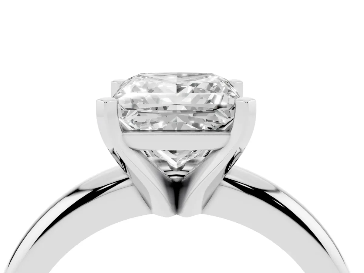 Princess Cut Diamond Solitaire Engagement Ring with Round Band and Four-Prong Setting Silver