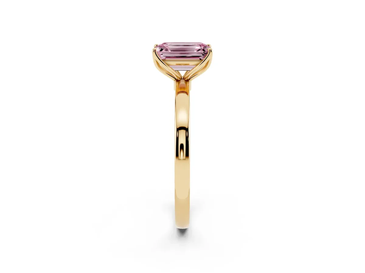 Fancy Pink Emerald Cut Diamond Solitaire Ring with Thin Band and Prong Setting Yellow gold
