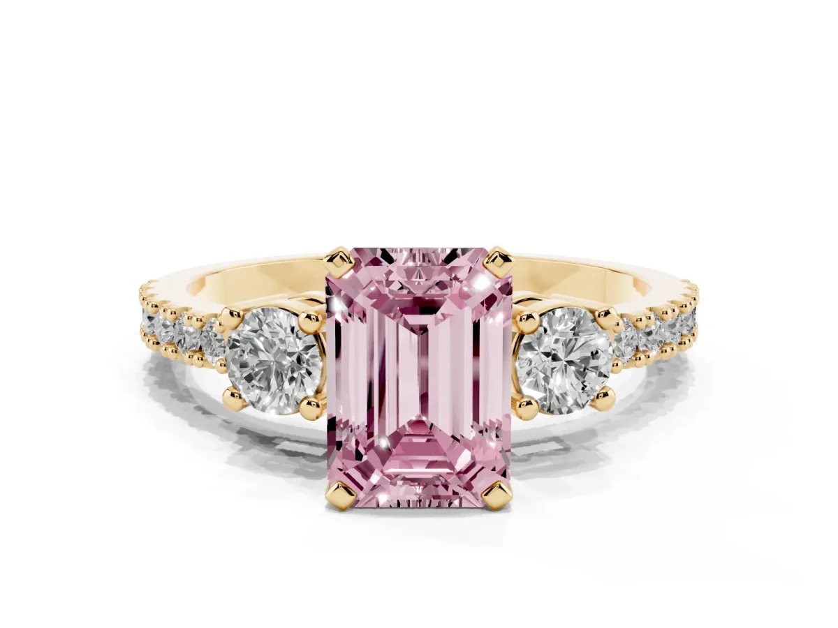 Fancy Pink Emerald Cut Three-Stone Diamond Pavé Band with Prong Setting Yellow gold