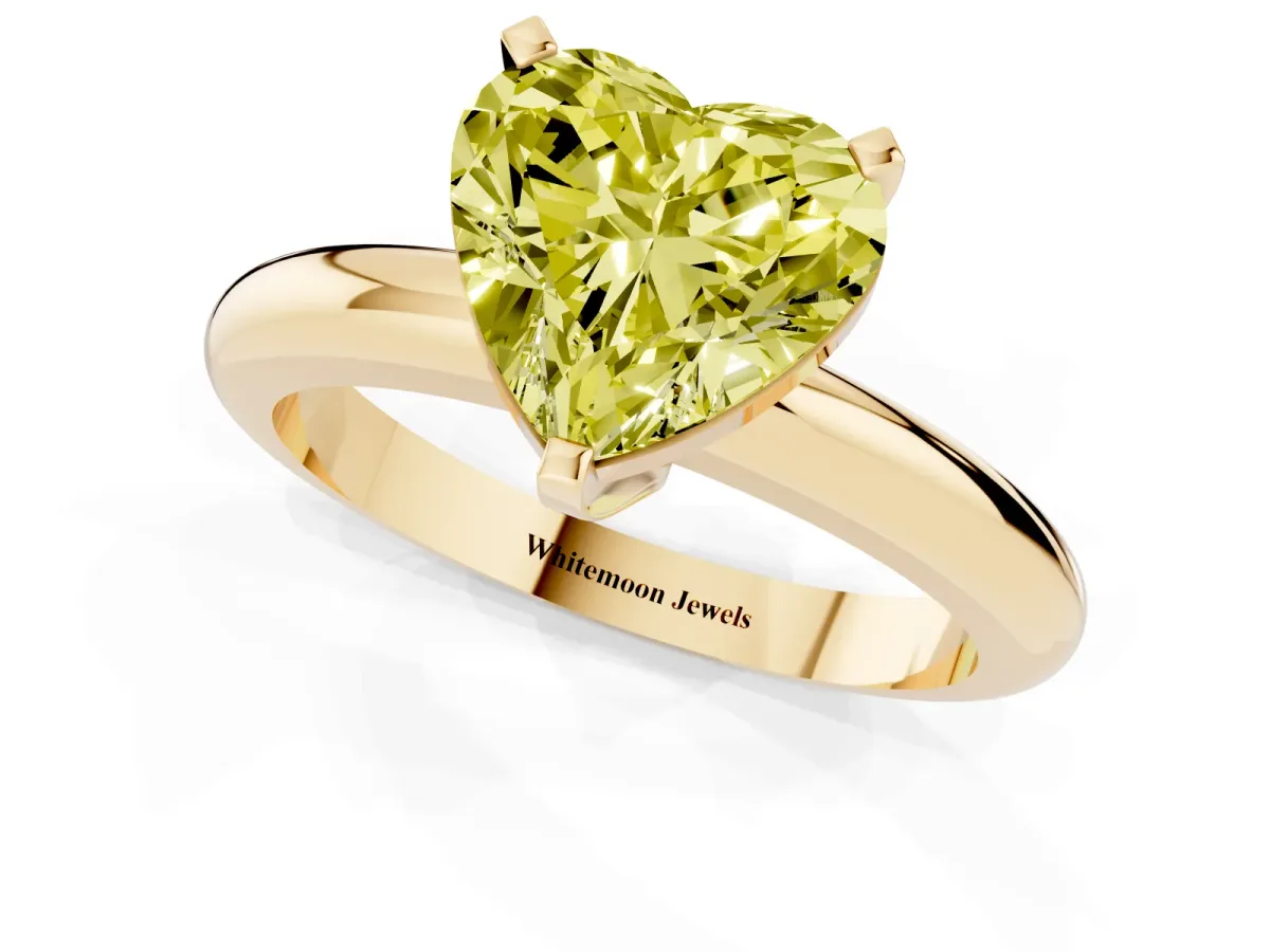 Fancy Yellow Heart Cut Diamond Solitaire Engagement Ring with Round Band and Four-Prong Setting Yellow gold