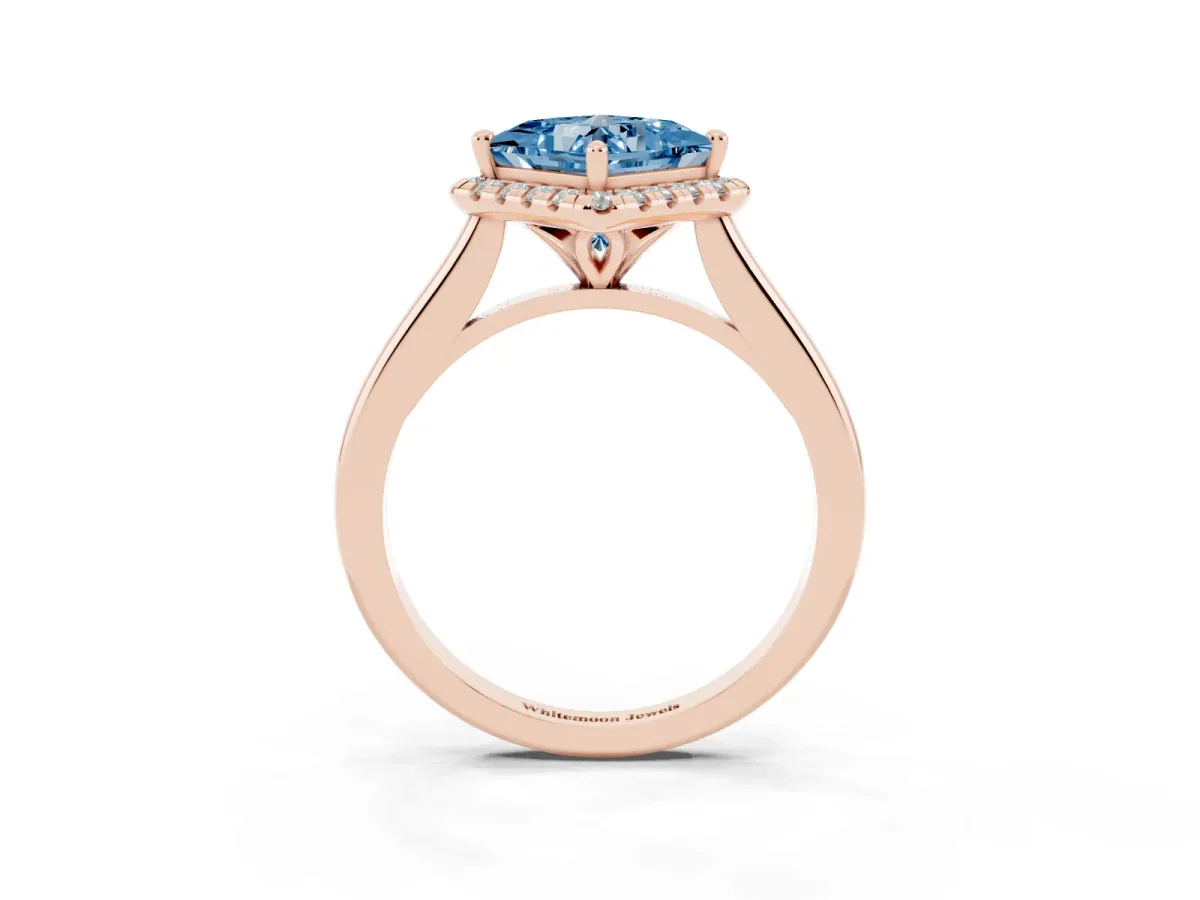 Fancy Blue Princess Cut Halo Round Diamond Solitaire Engagement Ring with Pave Band and Four-Prong Setting Rose gold