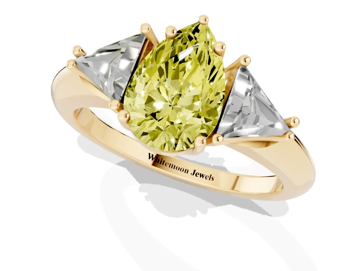 Fancy Yellow Three-Stone Pear Cut Diamond Engagement Ring with Trillion Side Stones and Prong Setting Yellow gold