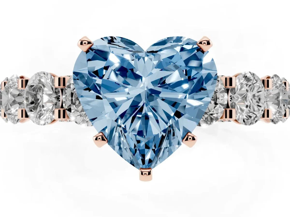 Fancy Blue Heart Cut Diamond Side Stone Engagement Ring with Four-Prong Setting Rose gold