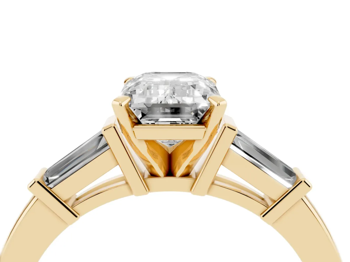 Emerald Cut Cut Diamond Solitaire Ring with Tapered Baguette Accents and Four-Prong Setting Yellow gold