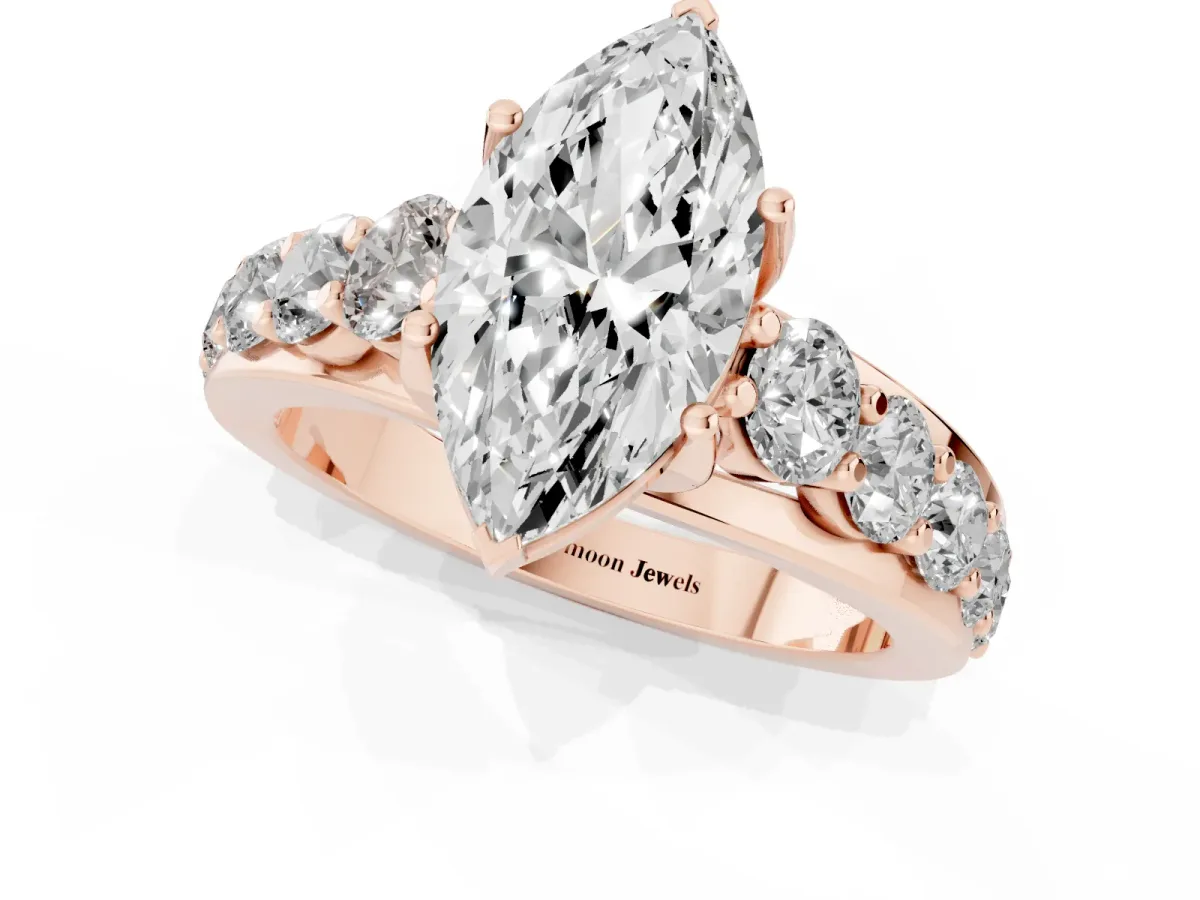 Marquise Cut Diamond Engagement Ring with Pavé Band and Four-Prong Setting Rose gold