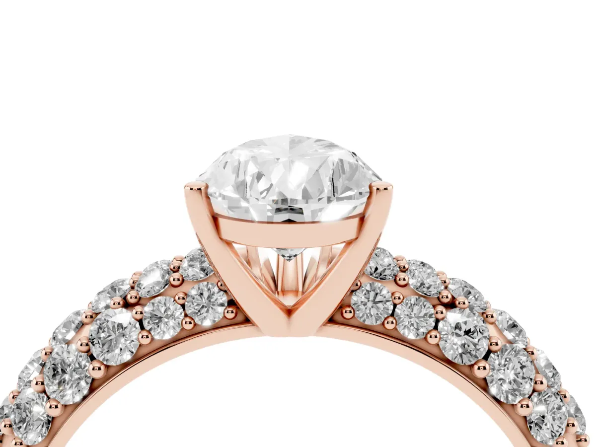 Pear Cut Diamond Pavé Band Solitaire Ring with Four-Prong Setting Rose gold
