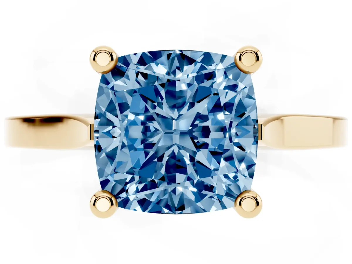 Fancy Blue Cushion Cut Solitaire Diamond Ring with Four-Prong Setting and Tapered Band Yellow gold