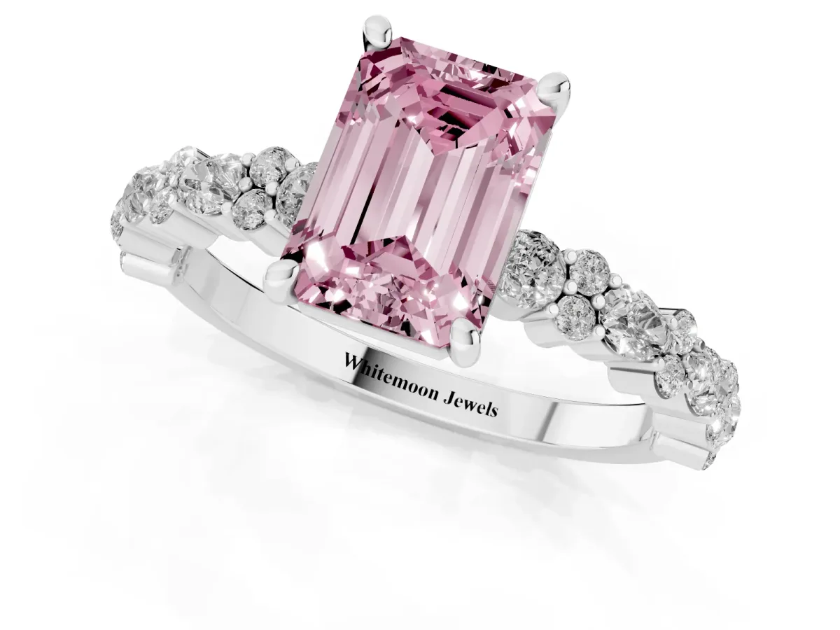 Fancy Pink Emerald Cut Diamond Side Stone Solitaire Ring with Round and Four-Prong Setting Platinum