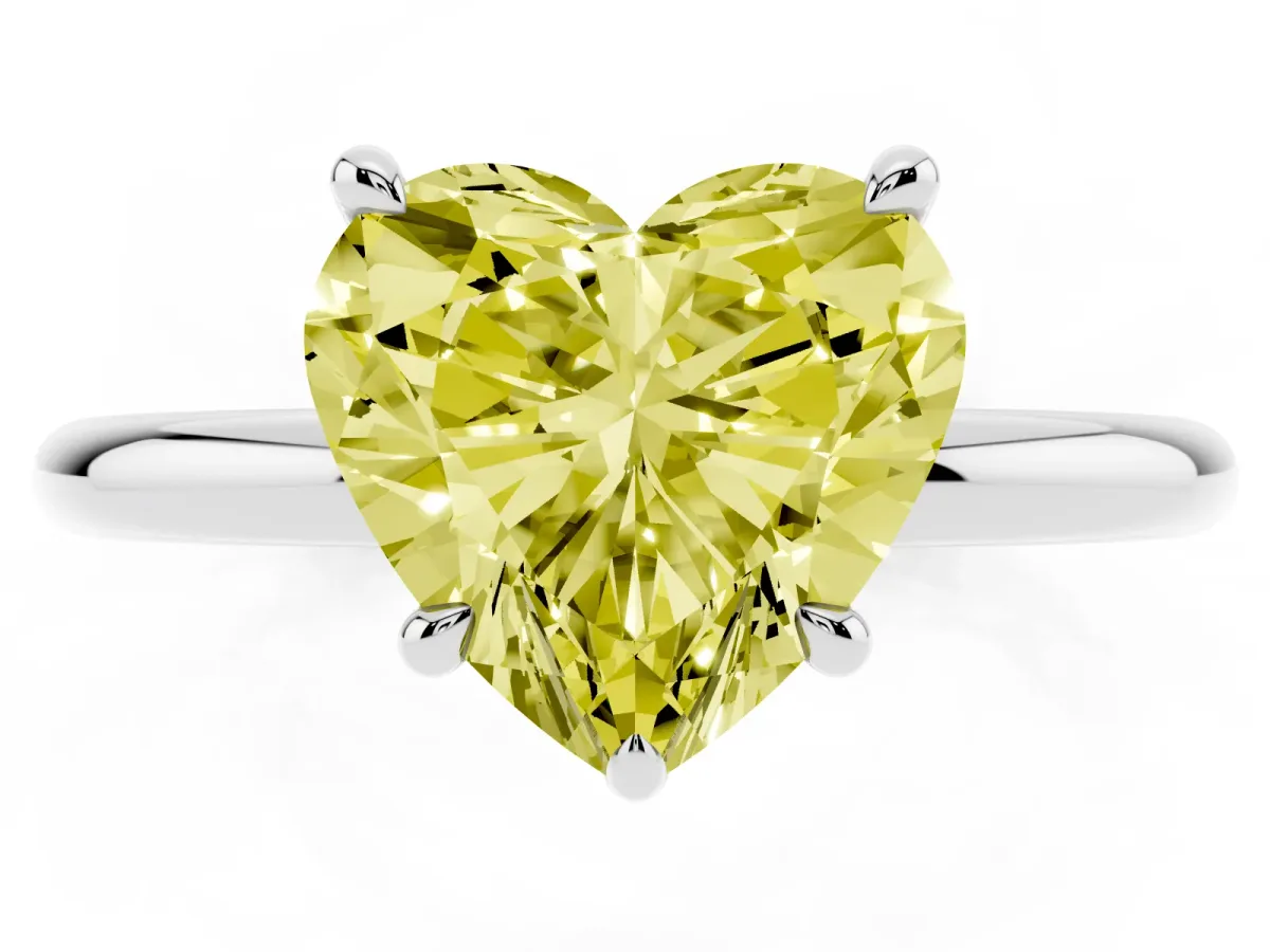 Fancy Yellow Heart Cut Diamond Solitaire Ring with Thin Band and Four-Prong Setting Silver