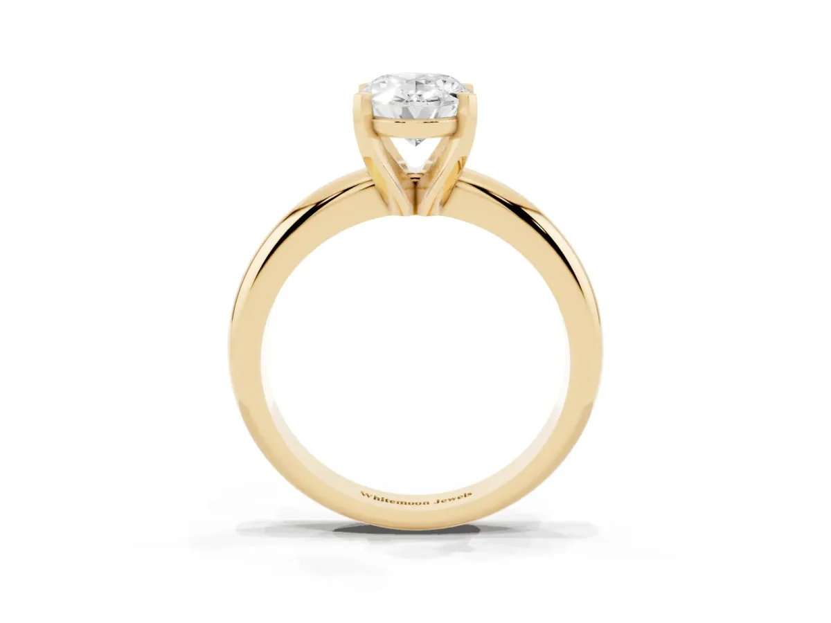 Oval Cut Diamond Solitaire Engagement Ring with Round Band and Four-Prong Setting Yellow gold